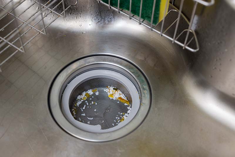 Food Debris Clogging Kitchen Sink Drain Strainer food scraps clogging kitchen sink drain strainer