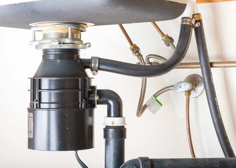 Garbage Disposal Unit Installed Under Kitchen Sink garbage disposal unit fully installed under kitchen sink with drain connections